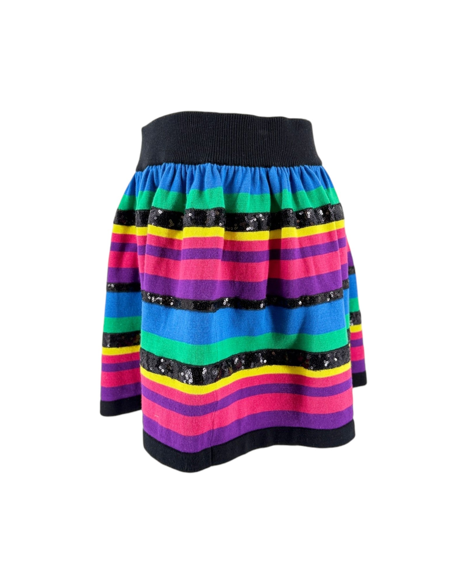 A colorful striped knit skirt with horizontal bands of blue, green, yellow, pink, purple, and black, accented with sequined black bands, shown against a plain white background.