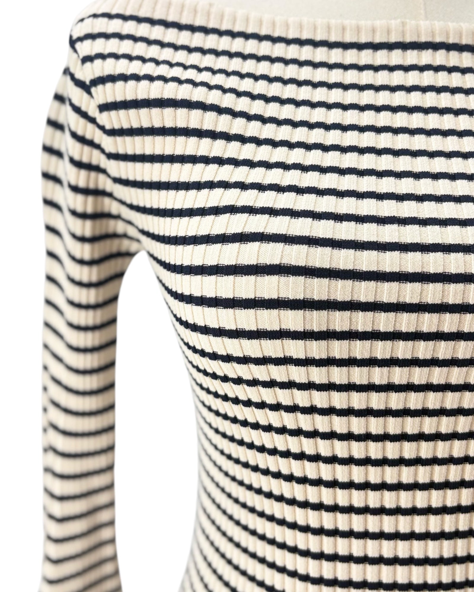 Close-up of a black and white striped top