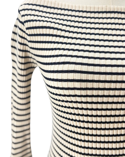 Close-up of a black and white striped top