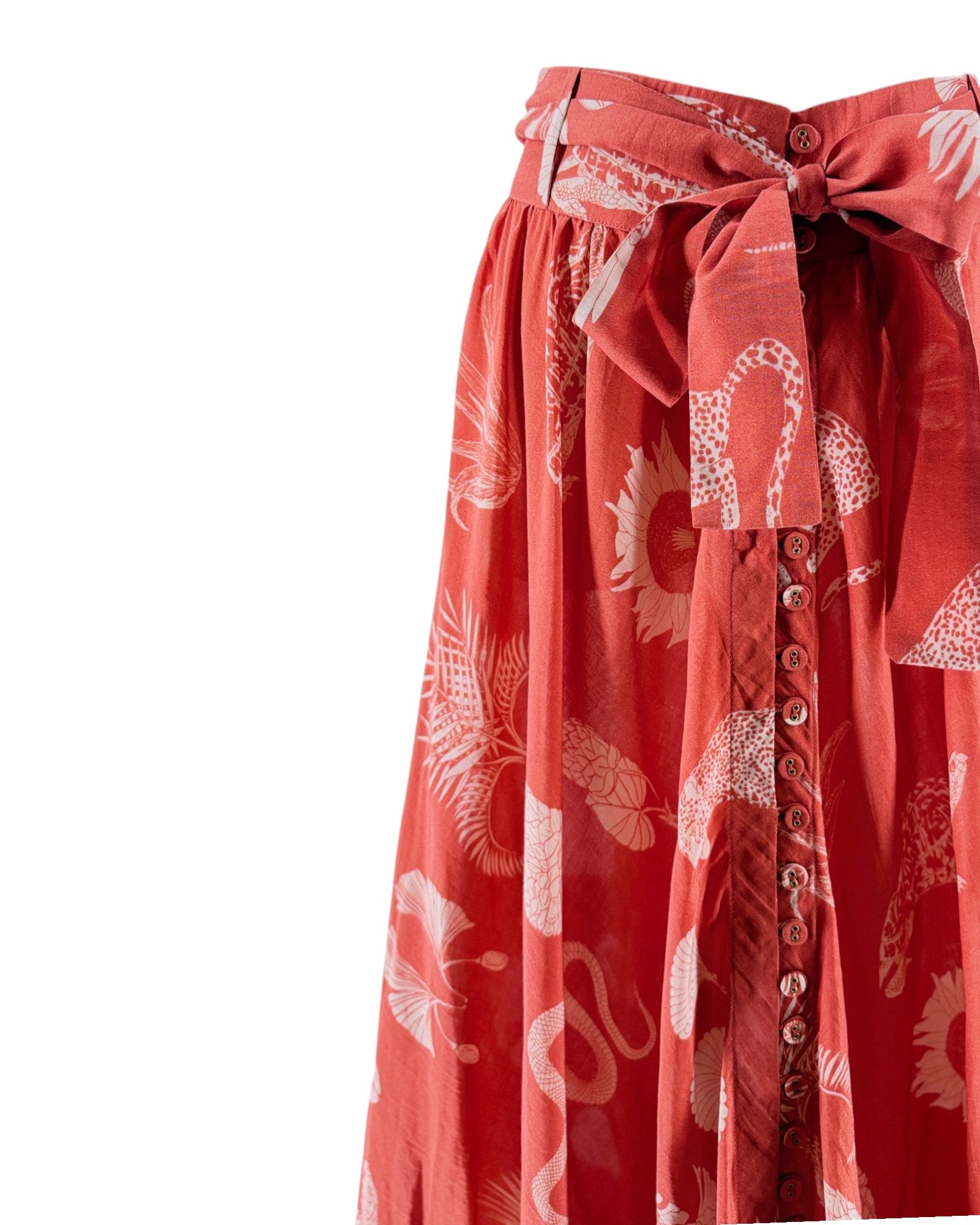 Red skirt with white floral pattern on a white background