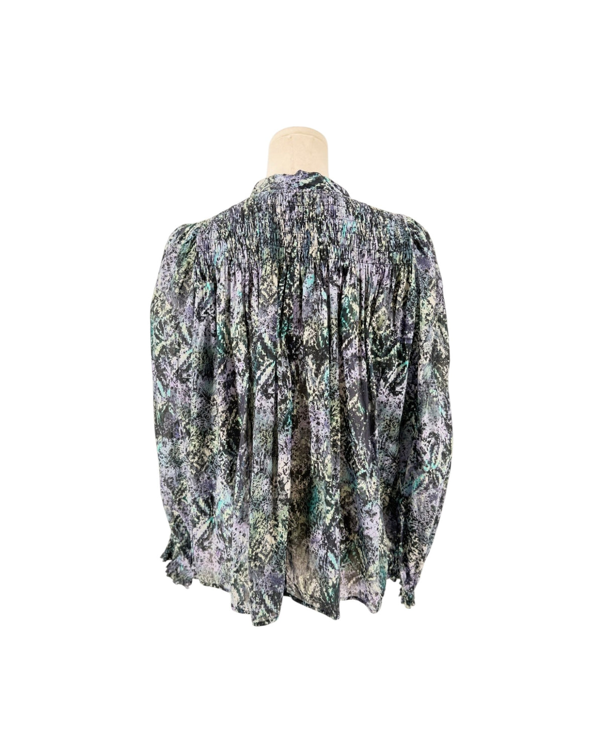 Long sleeve multicolor blouse on a mannequin on a white background