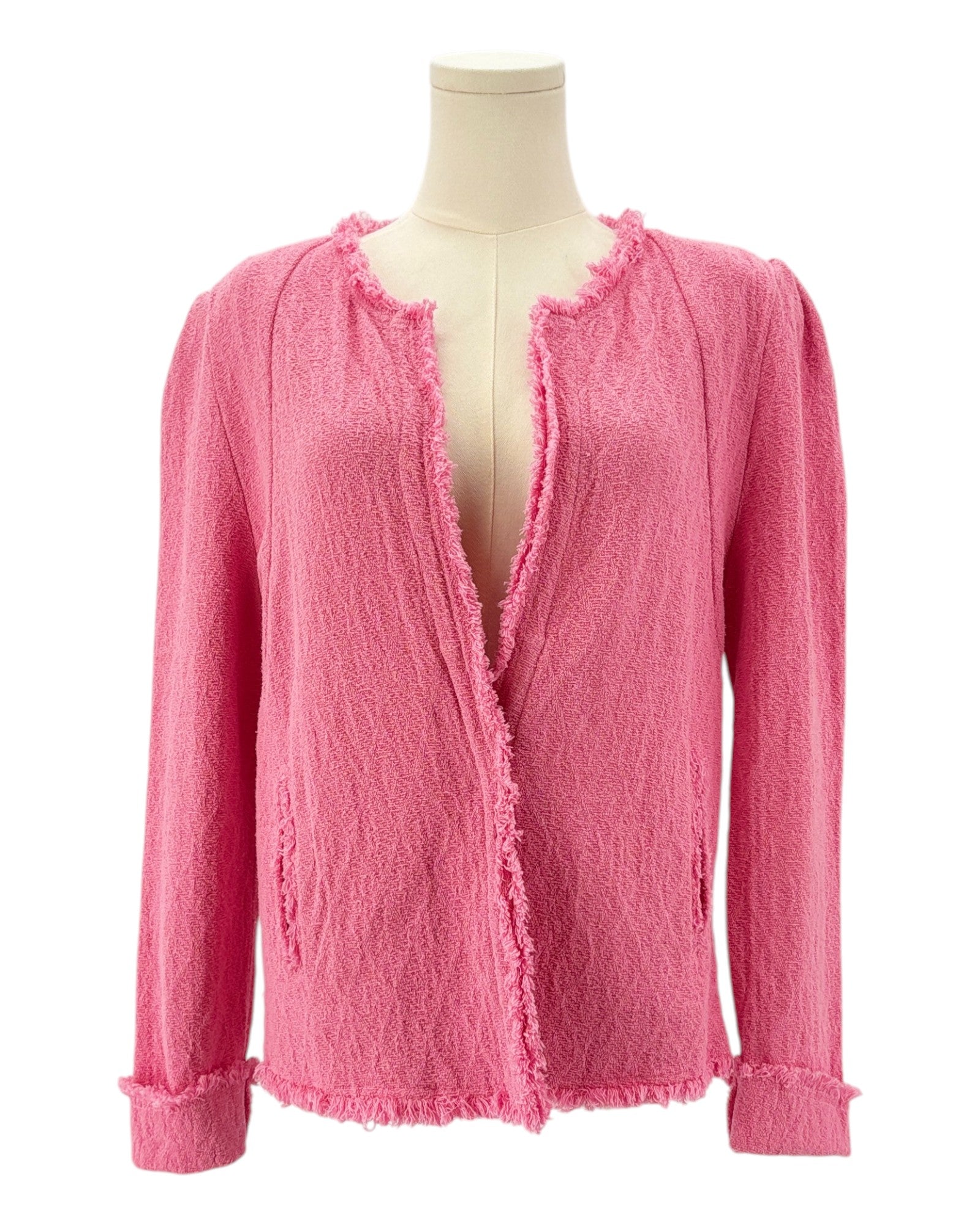 Pink textured jacket on a mannequin against a white background