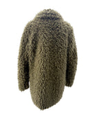 Green fluffy jacket on a white background