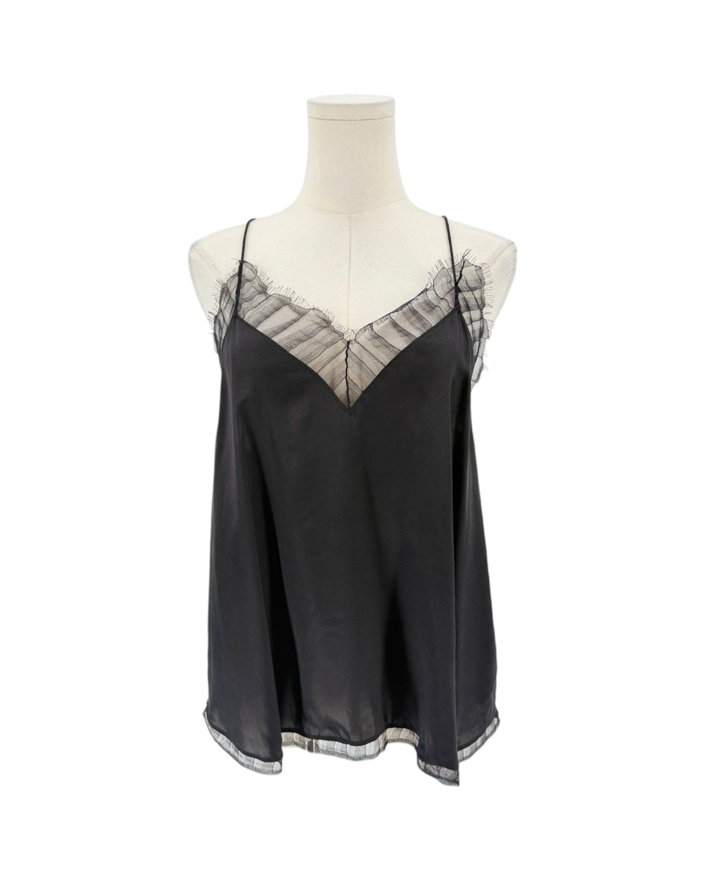 A black satin camisole slip with sheer black lace trim along the V-neckline and thin spaghetti straps, displayed on a cream mannequin torso against a white background.