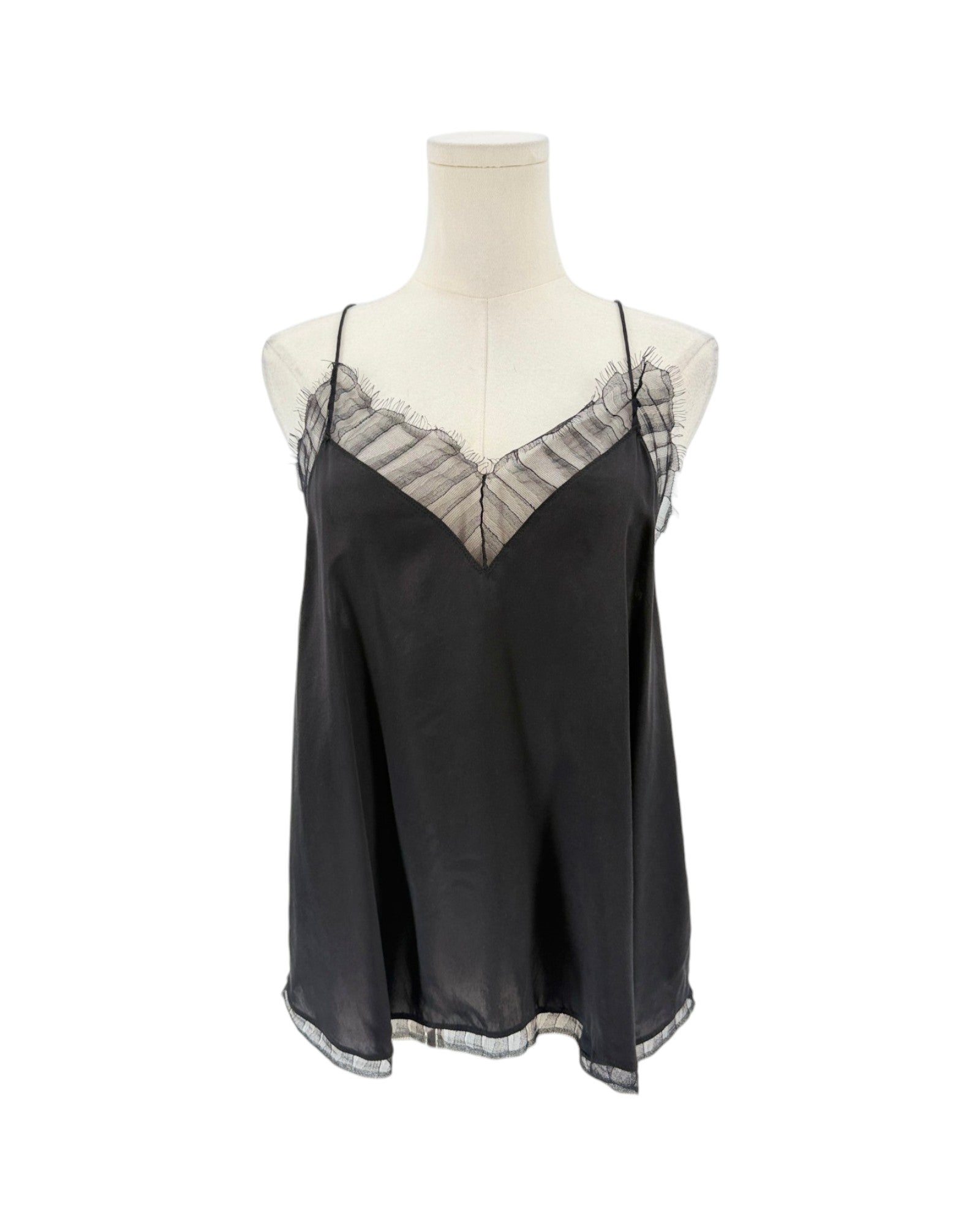 A black satin camisole slip with sheer black lace trim along the V-neckline and thin spaghetti straps, displayed on a cream mannequin torso against a white background.
