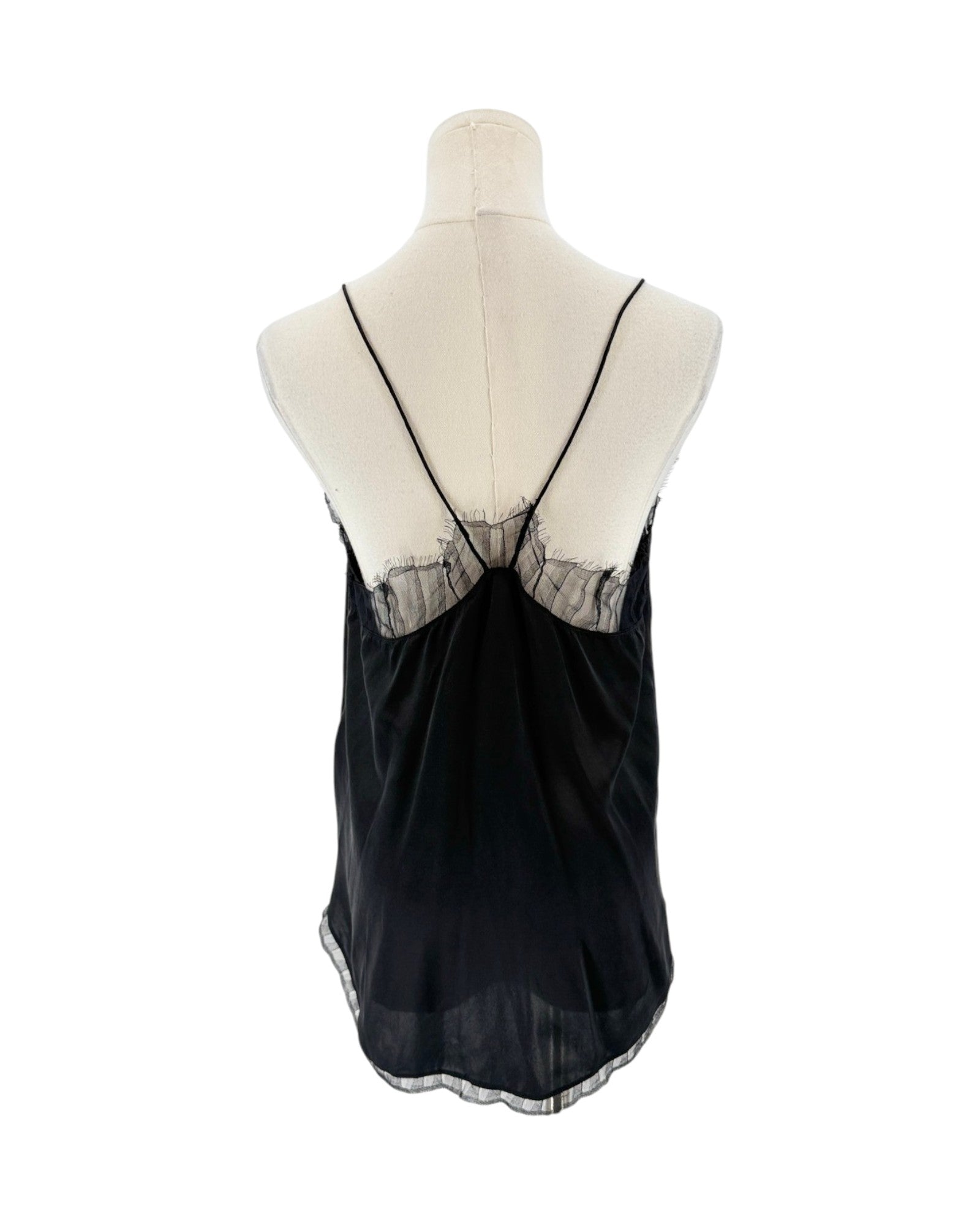 A black sheer camisole top displayed on a cream mannequin torso, showing the back view with thin straps and a lace-trimmed open back.