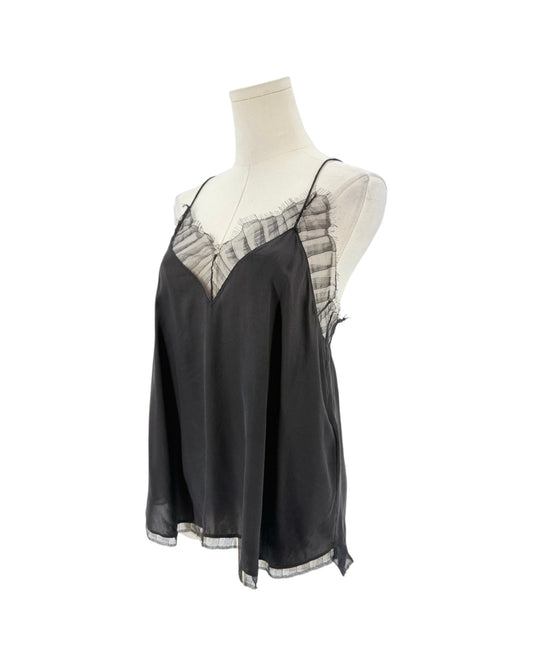 A black sheer camisole slip top with a gray and white striped ruffle trim along the neckline and hem, displayed on a cream mannequin torso against a white background.