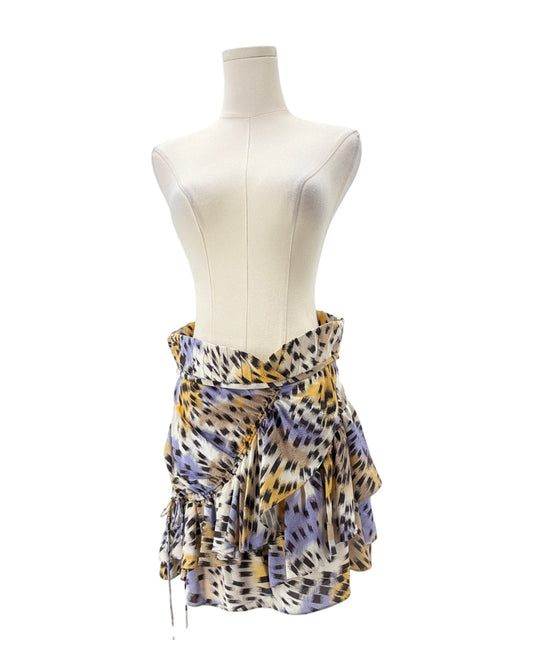 Mannequin wearing a patterned skirt on a white background