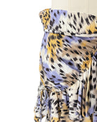 Colorful strapless top with abstract pattern on a white background