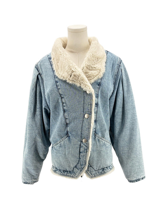 Denim jacket with white sherpa lining on a mannequin against a white background