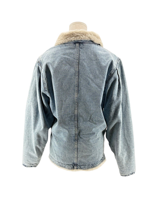 Back view of a denim jacket with shearling collar on a mannequin against a white background