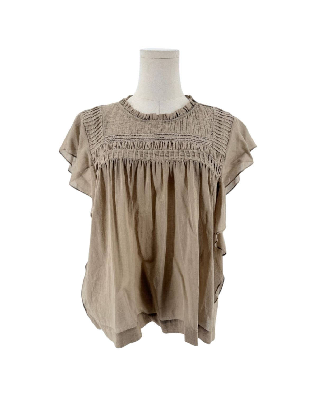 Beige short sleeve top with smocked yoke bodice, ruffled crewneck, tiered bohemian flutter sleeves on a mannequin on a white background