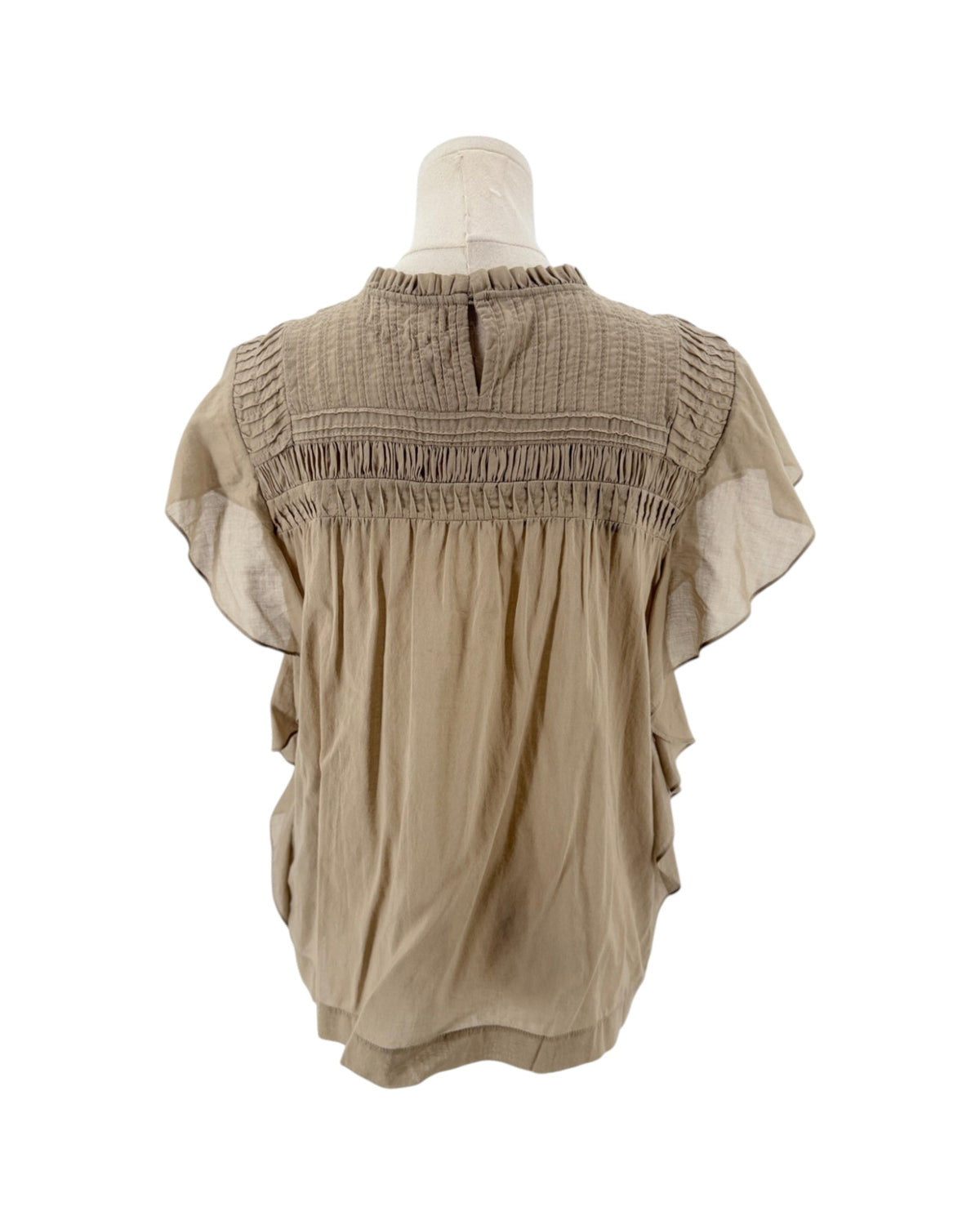 Beige short sleeve top with smocked yoke bodice, ruffled crewneck, tiered bohemian flutter sleeves on a mannequin on a white background