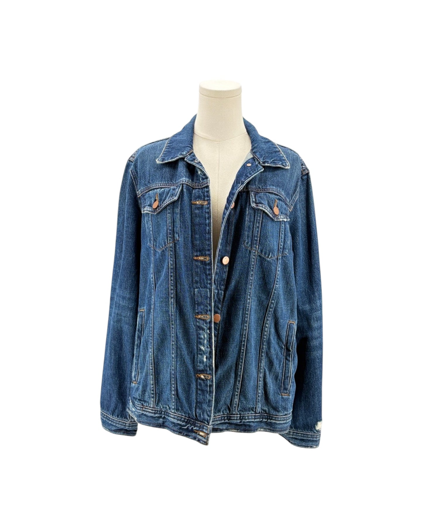 Blue denim jacket on a mannequin against a white background