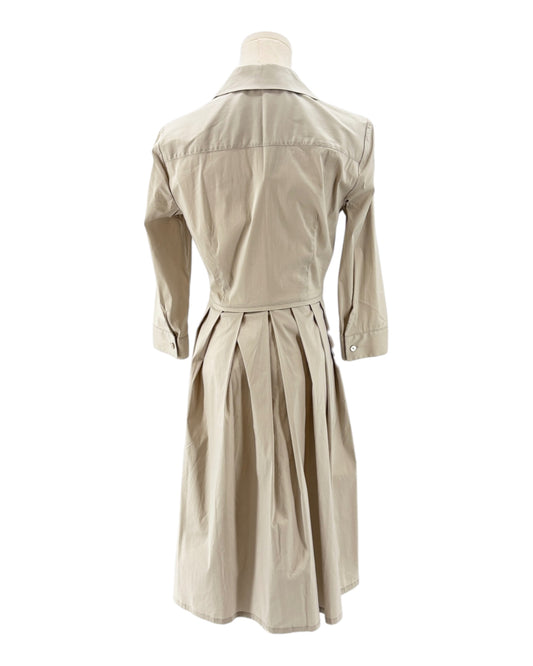 Beige long sleeve dress on a mannequin against a white background