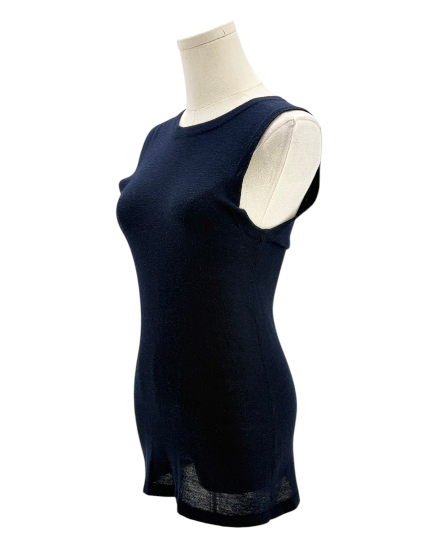 Navy blue sleeveless top on a mannequin against a white background