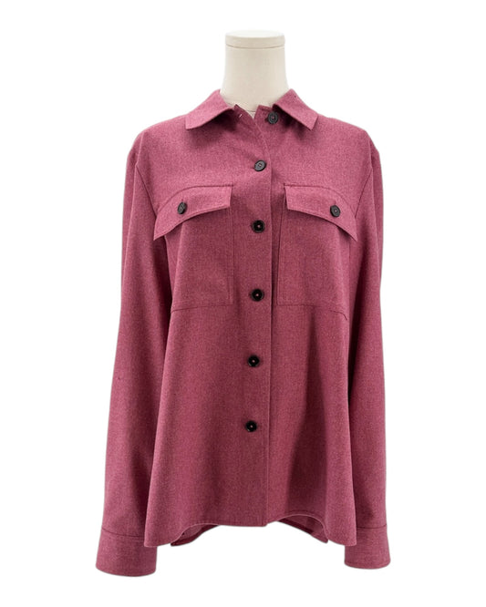Pink shirt on a mannequin against a white background