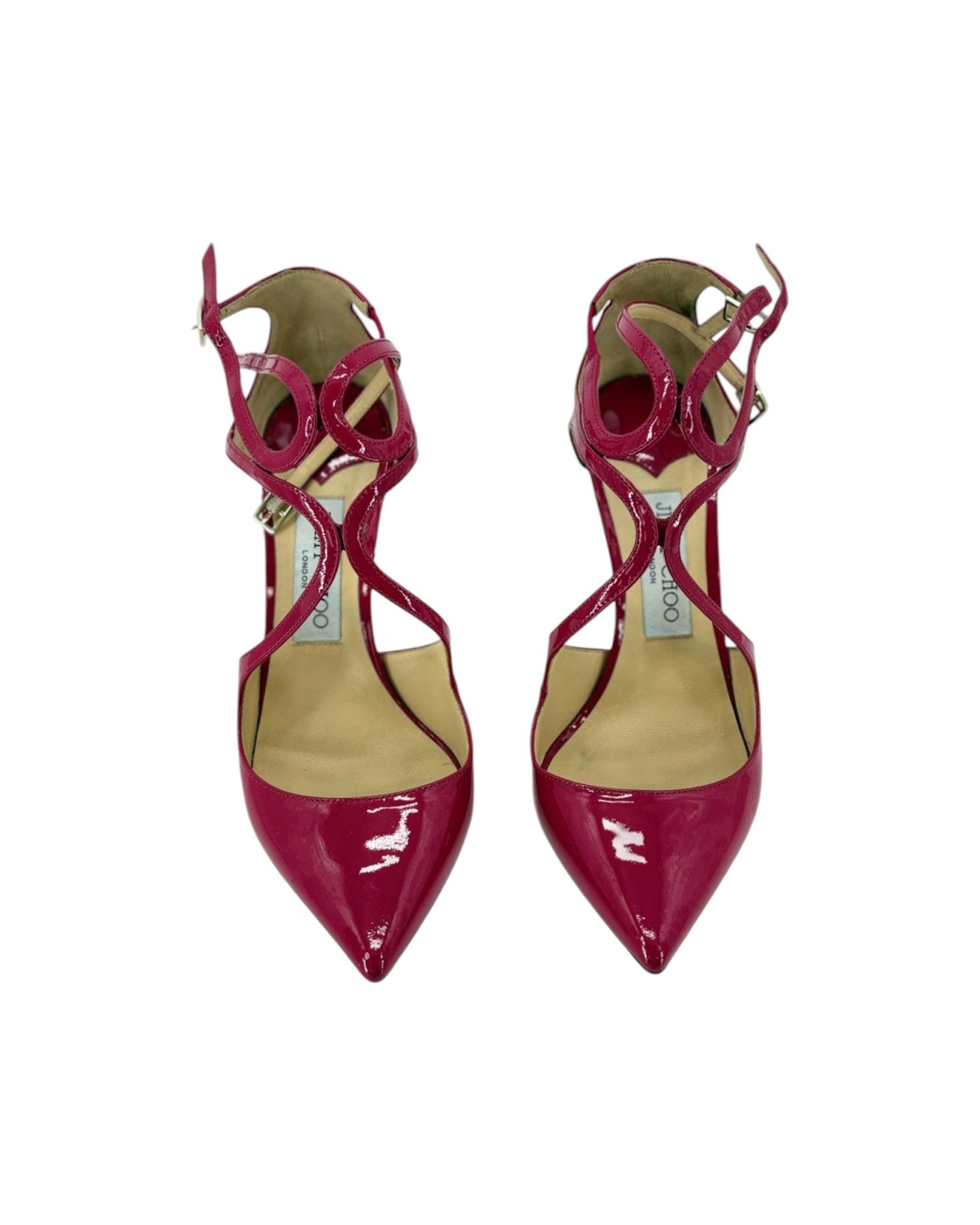 A pair of pointed-toe high heels in glossy patent burgundy with criss-cross ankle straps and a beige insole, shown against a plain white background.