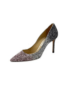 Sparkly high-heeled shoe on a white background