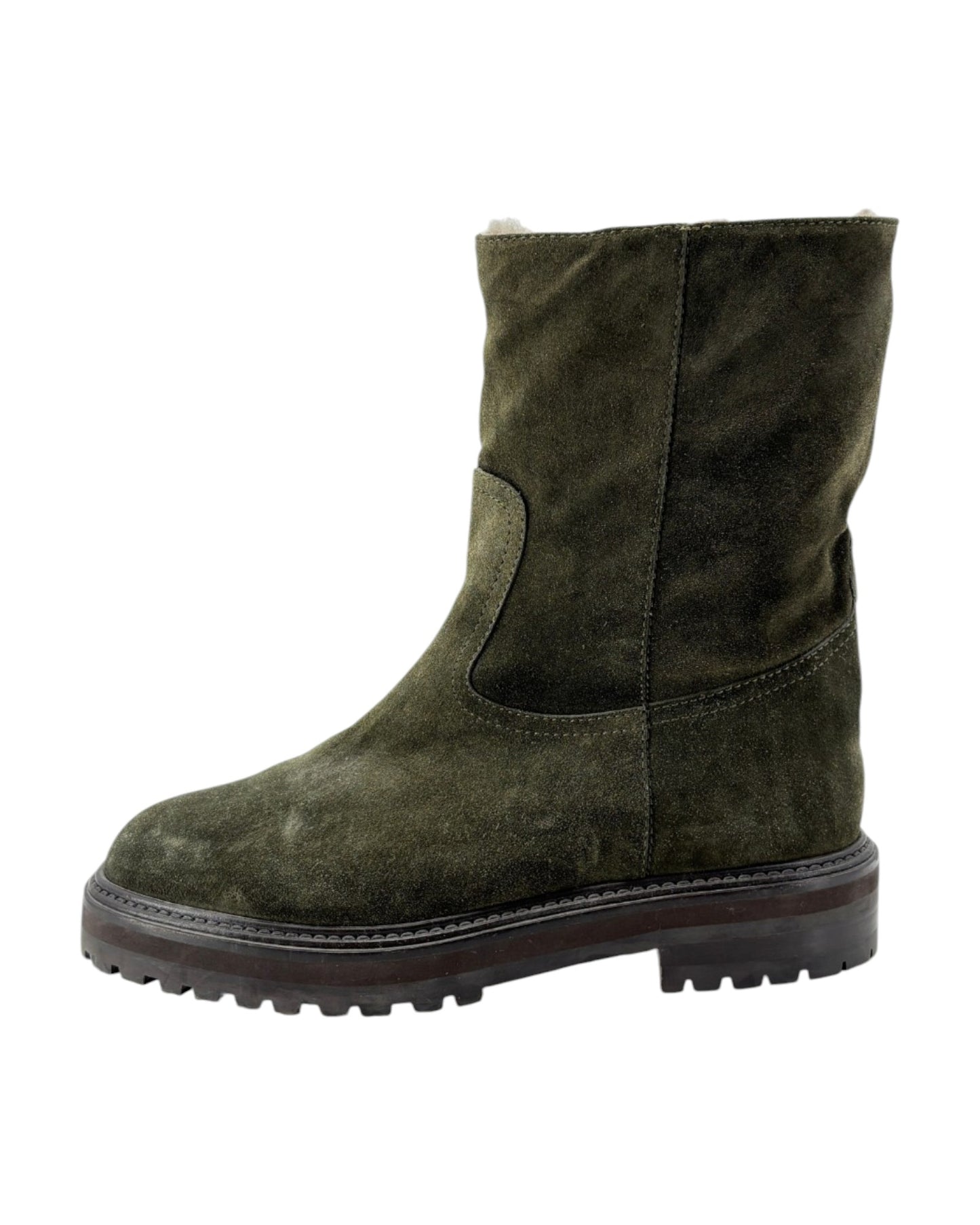 Green suede boot on a white background