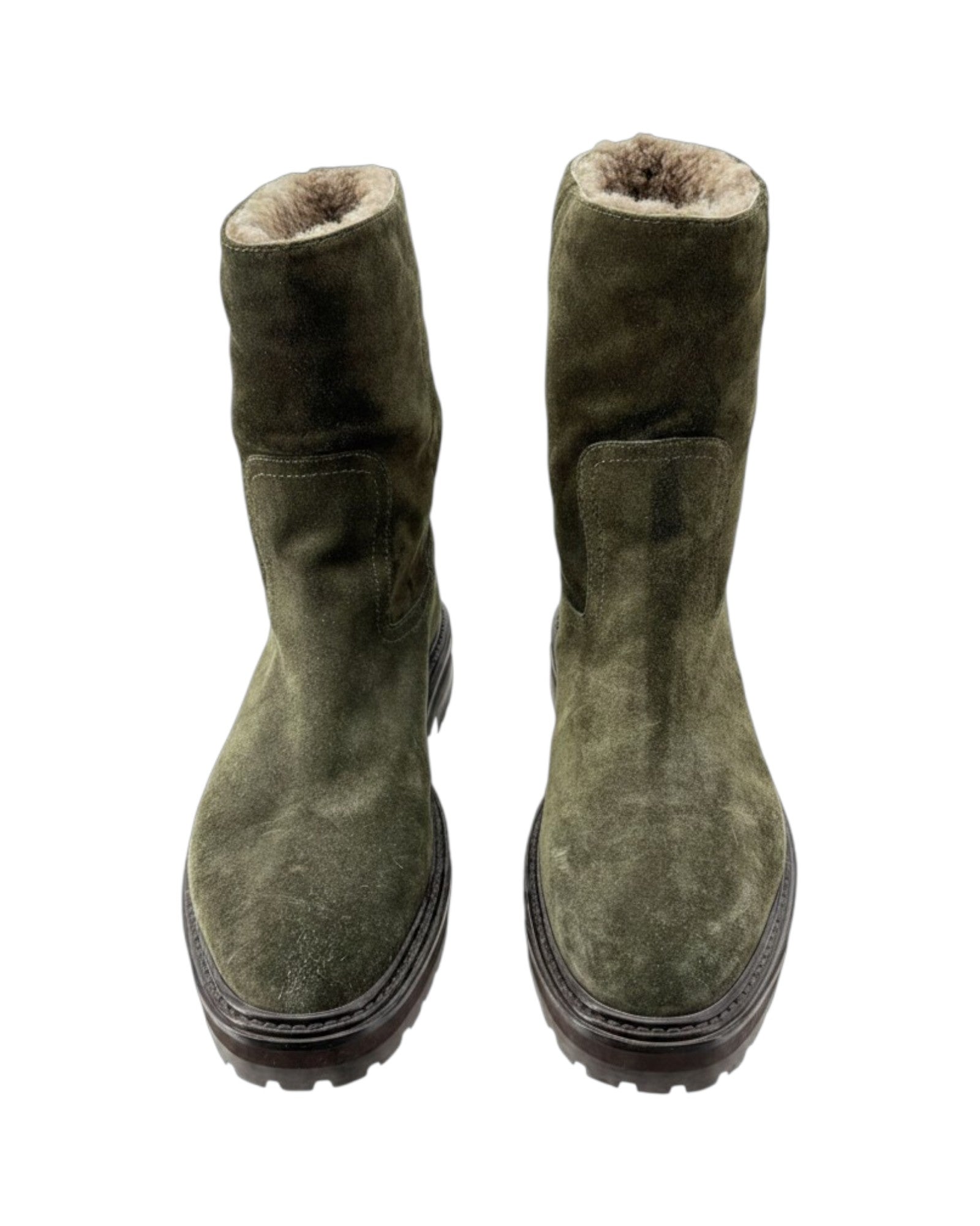 Pair of green suede boots with fur lining on a white background