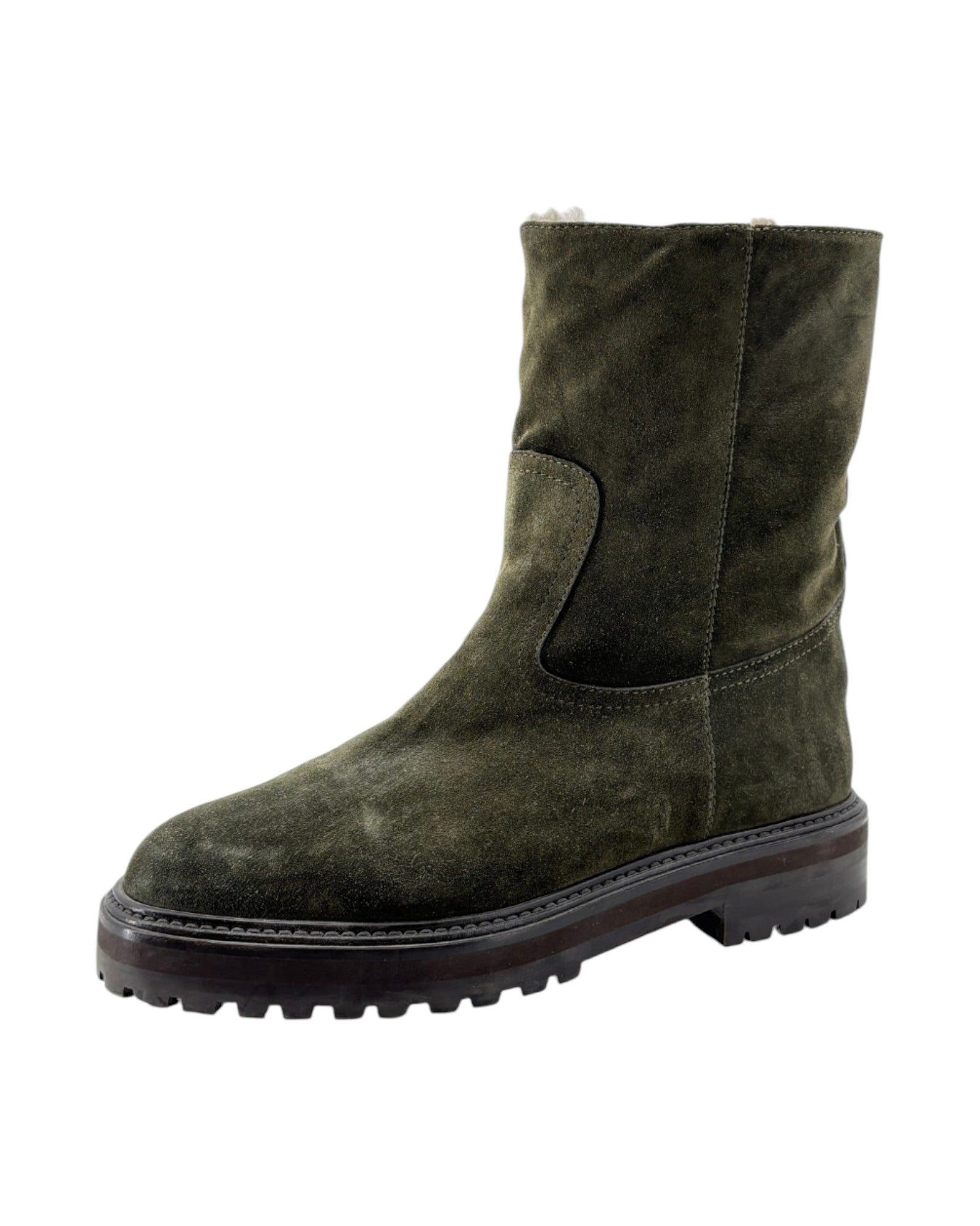 Green suede boot on a white background