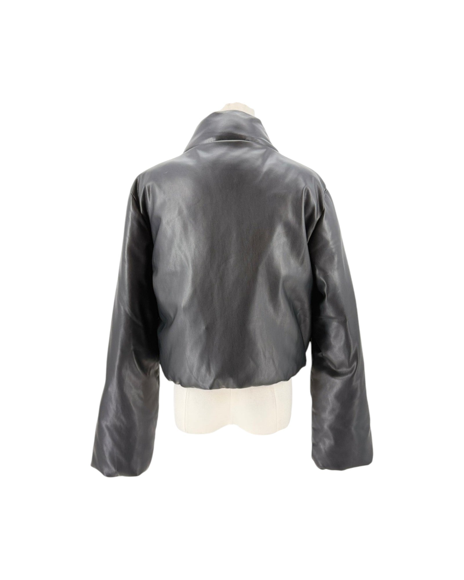 A black cropped leather jacket with a high collar, displayed on a mannequin torso against a plain white background.