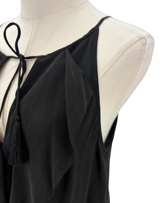 Black sleeveless top with tie details on a mannequin against a white background