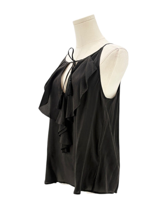 Black sleeveless top with ruffle details on a mannequin against a white background