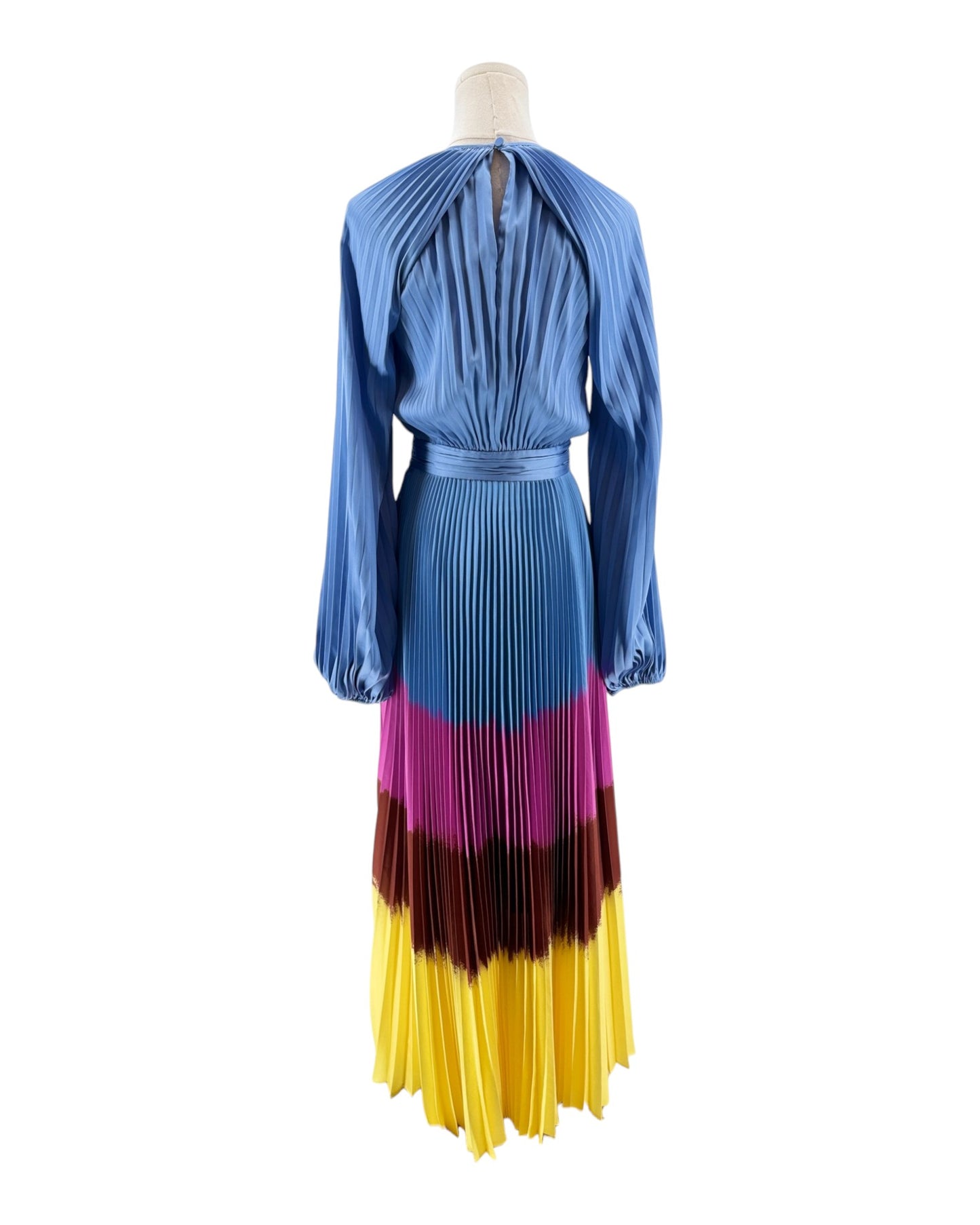 Colorful dress with a blue top and multicolored skirt on a mannequin against a white background