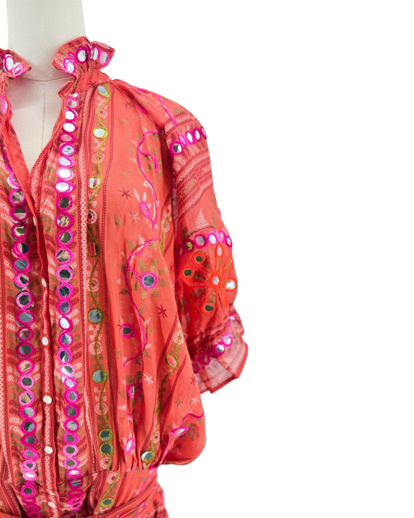 Red Dress with decorative patterns on a white background