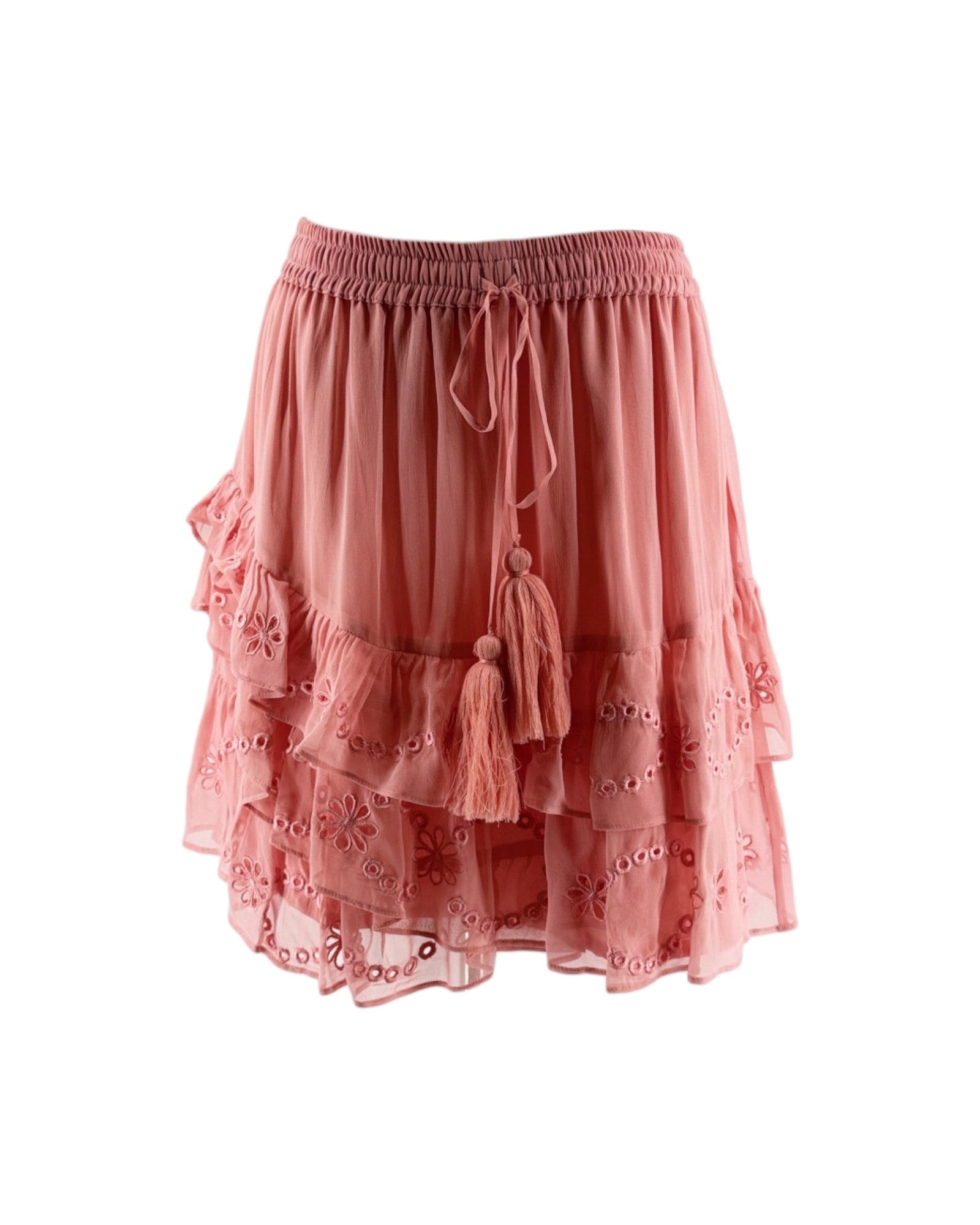 Pink skirt with tassels on a white background