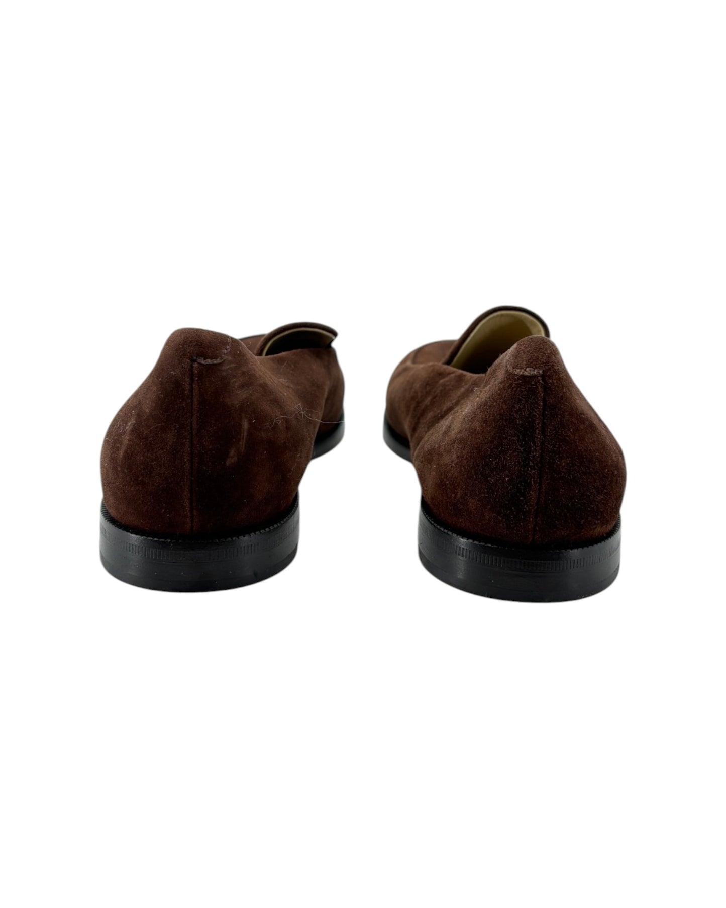 Pair of brown suede shoes on a white background