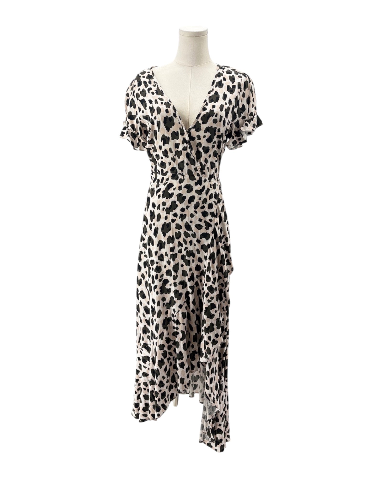 Leopard print dress on a mannequin against a white background