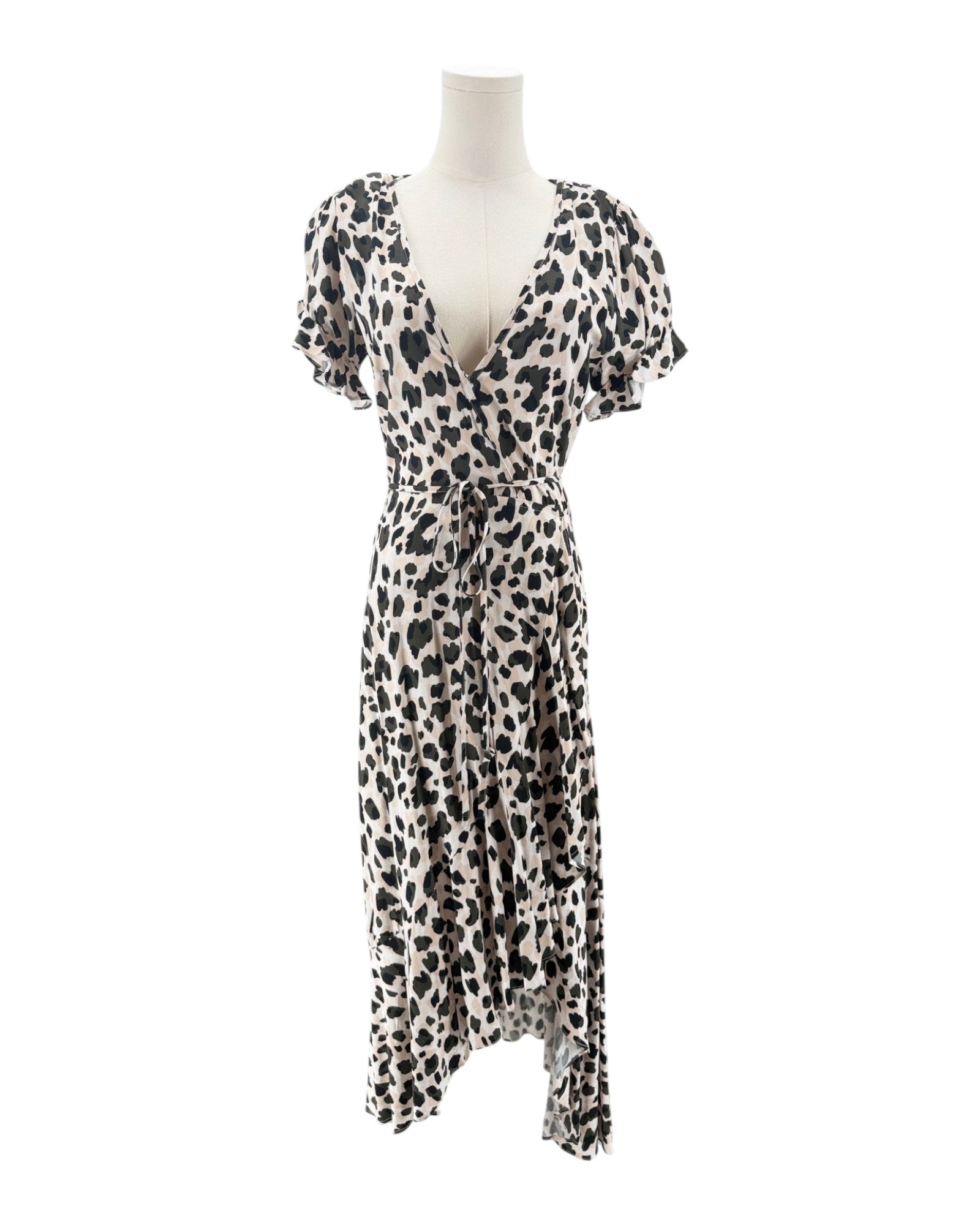 Leopard print dress on a mannequin against a white background
