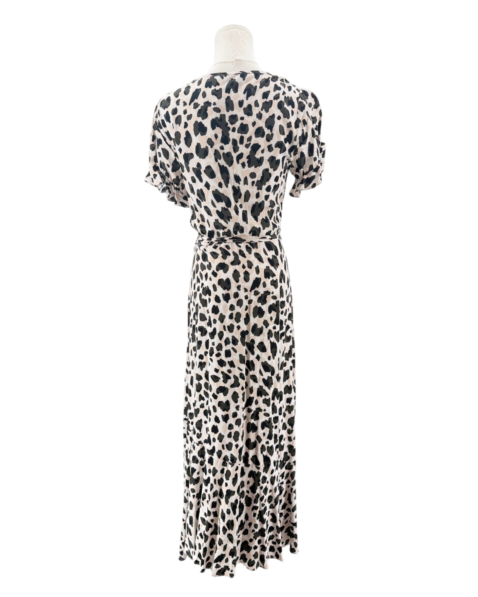 Leopard print dress on a mannequin against a white background