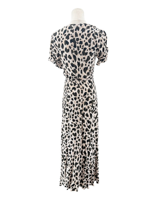 Leopard print dress on a mannequin against a white background