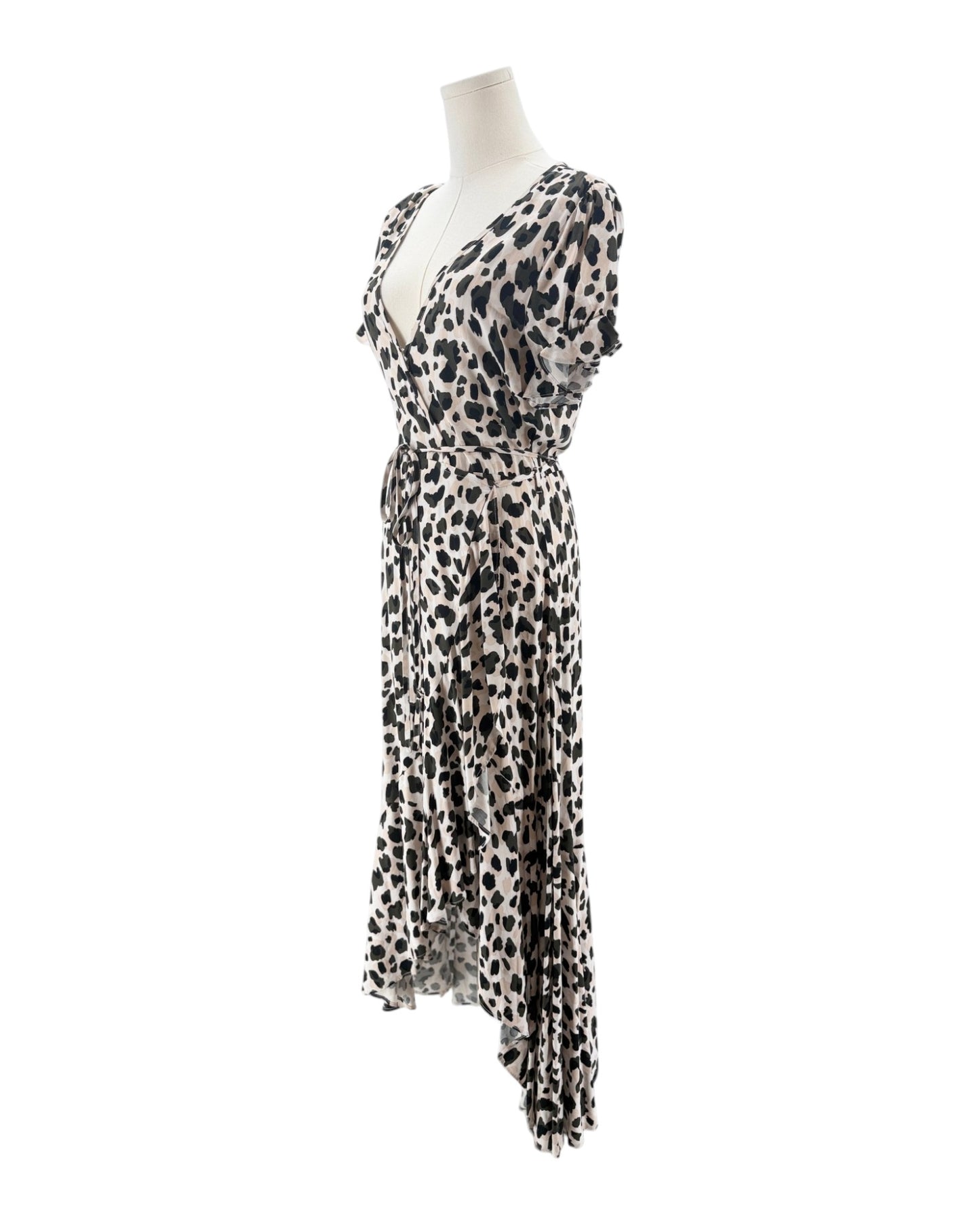 Leopard print dress on a mannequin against a white background