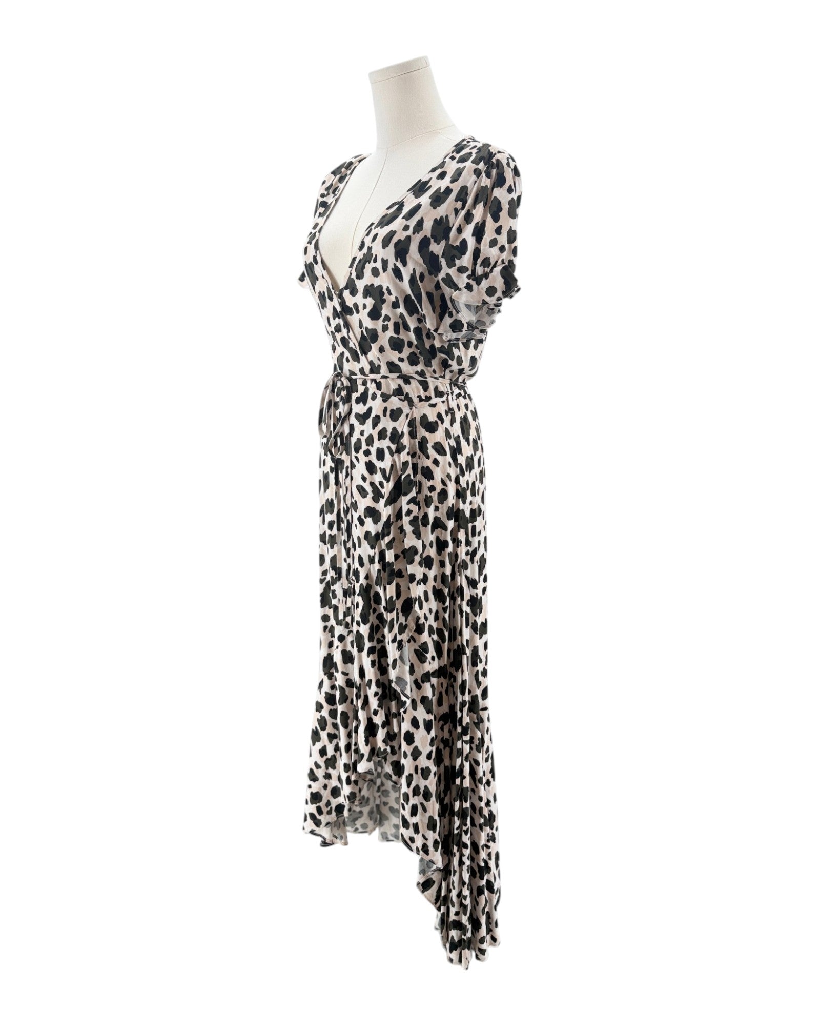Leopard print dress on a mannequin against a white background