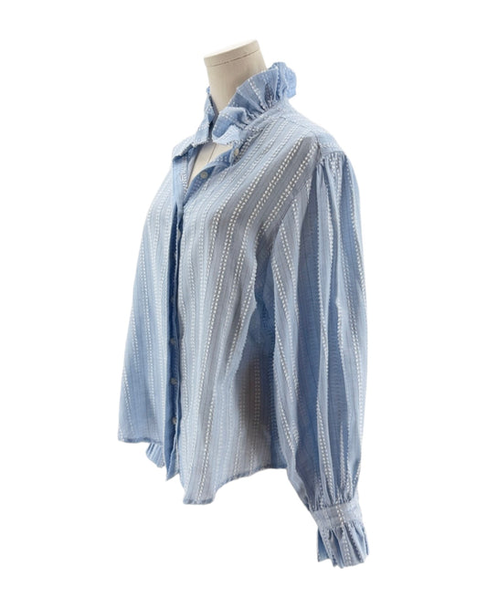 Blue and white checkered blouse on a mannequin against a white background