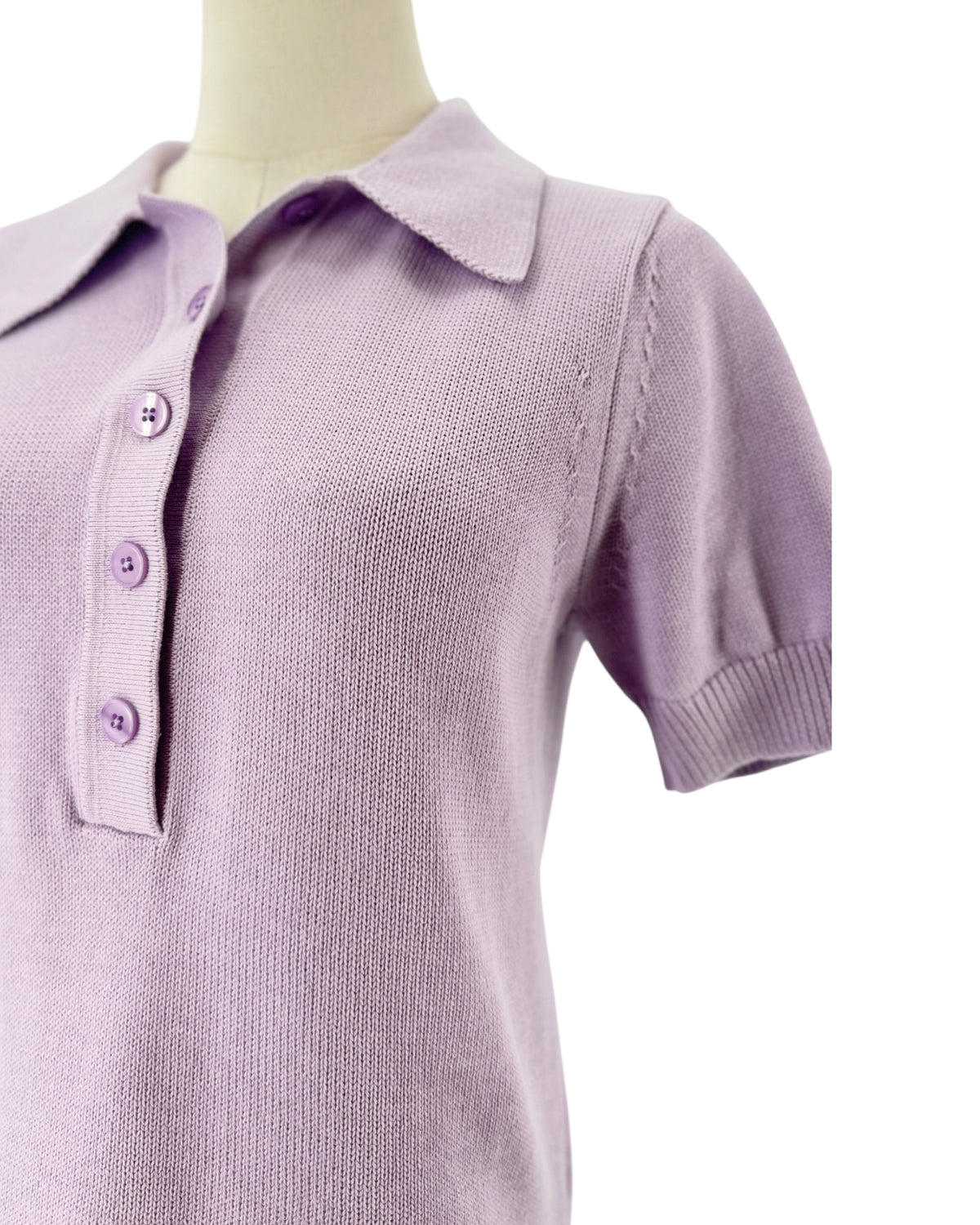 Purple Short sleeve puff sleeves, collar polo design, six button placket detail sweater on a white background on a mannequin