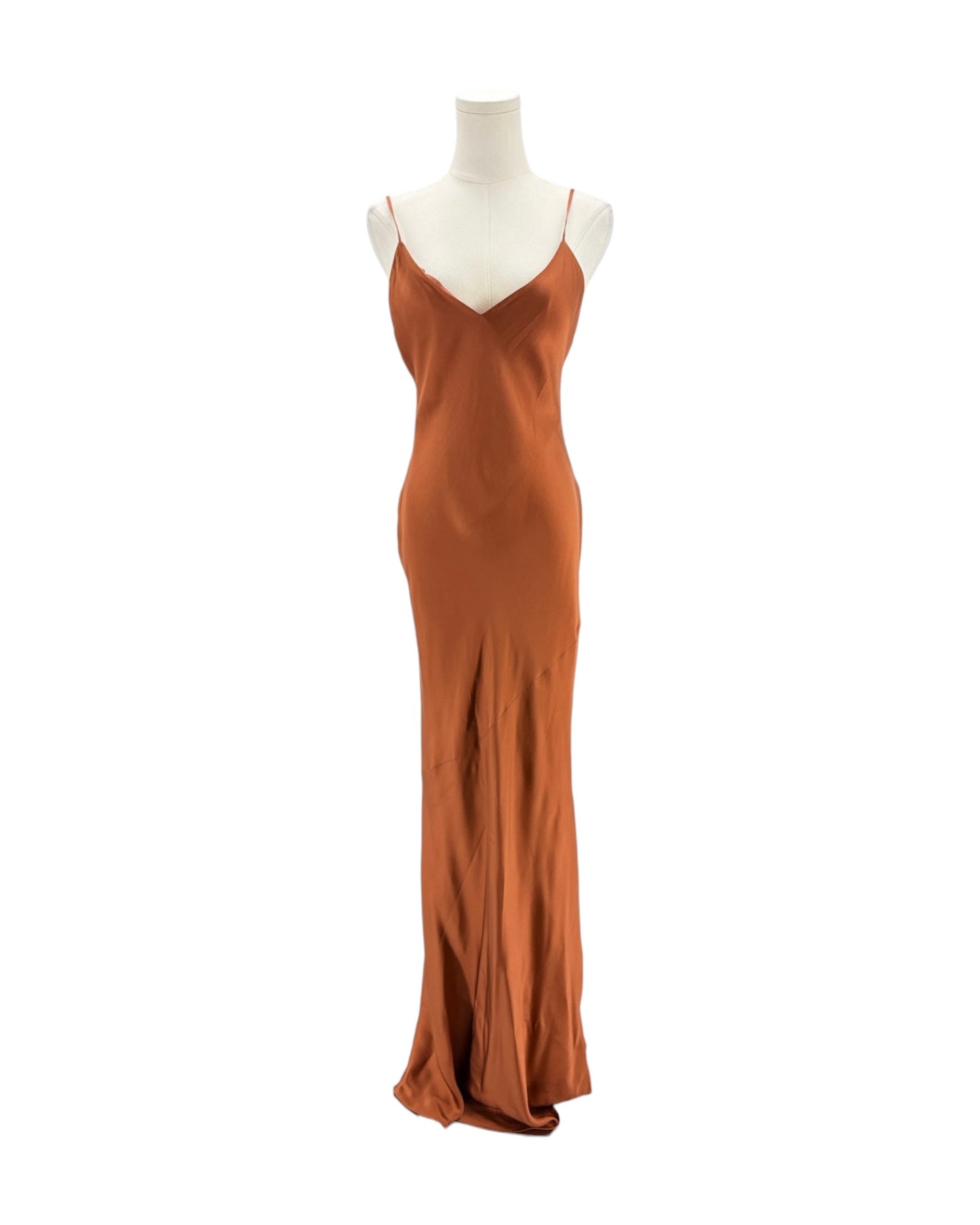 Brown evening gown on a mannequin against a white background