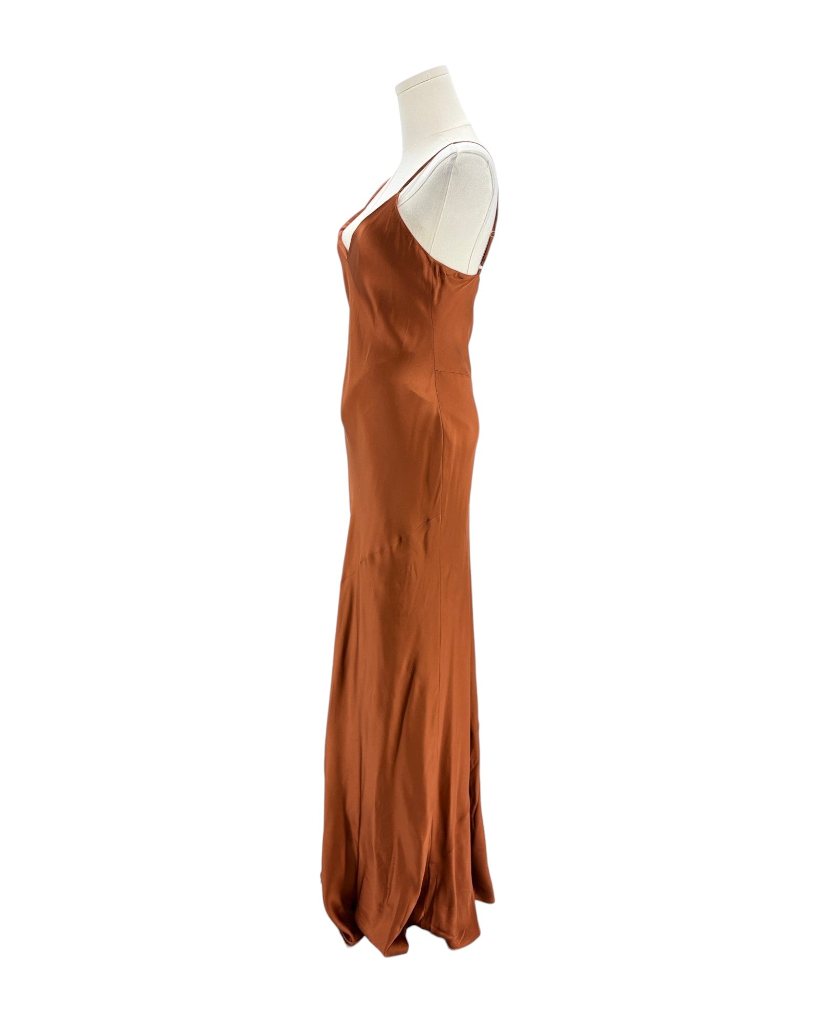 Brown evening gown on a mannequin against a white background