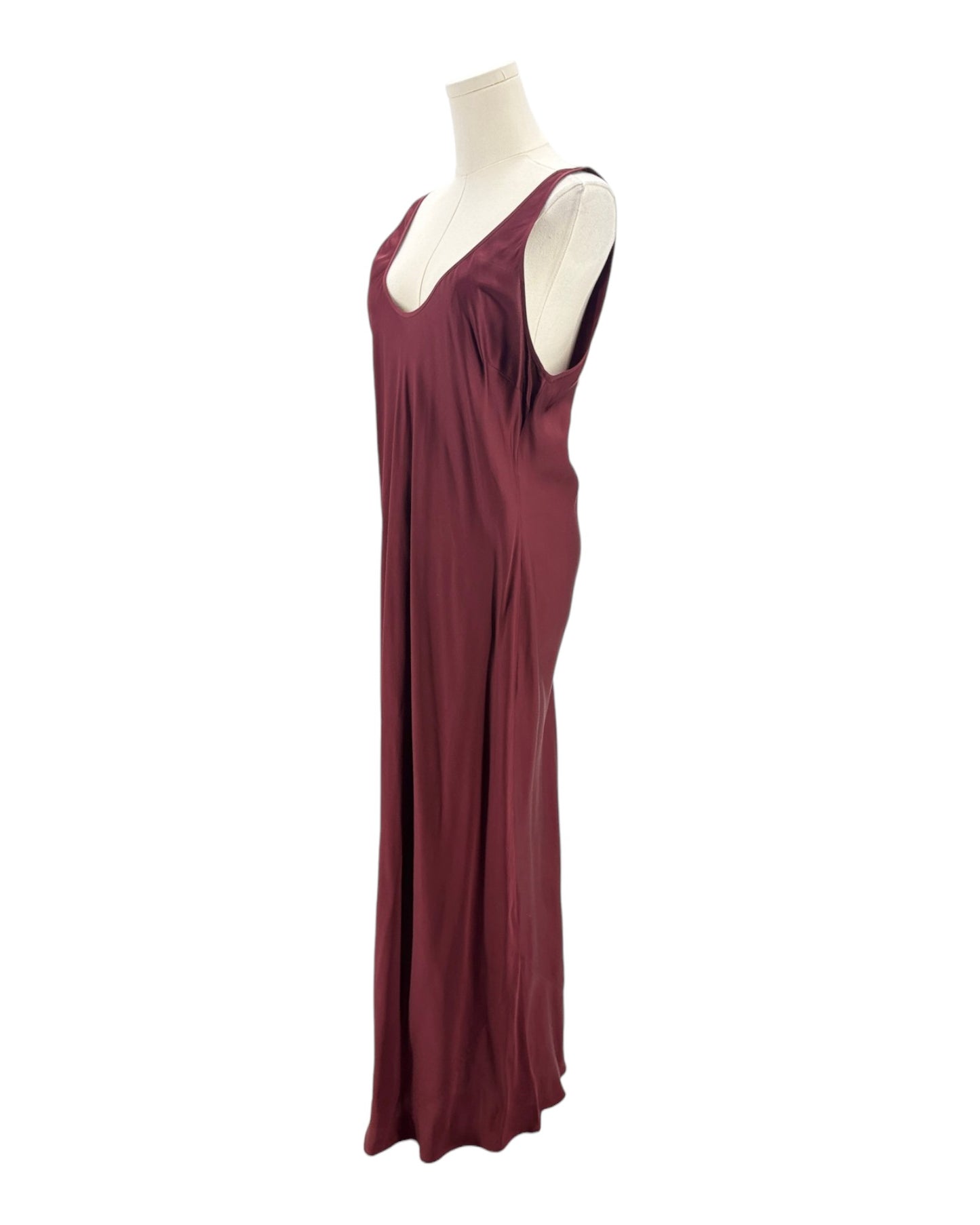 Maroon dress on a mannequin against a white background
