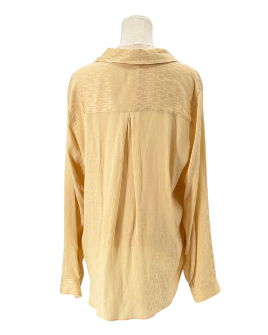 L'Agence shirt on a mannequin against a white background