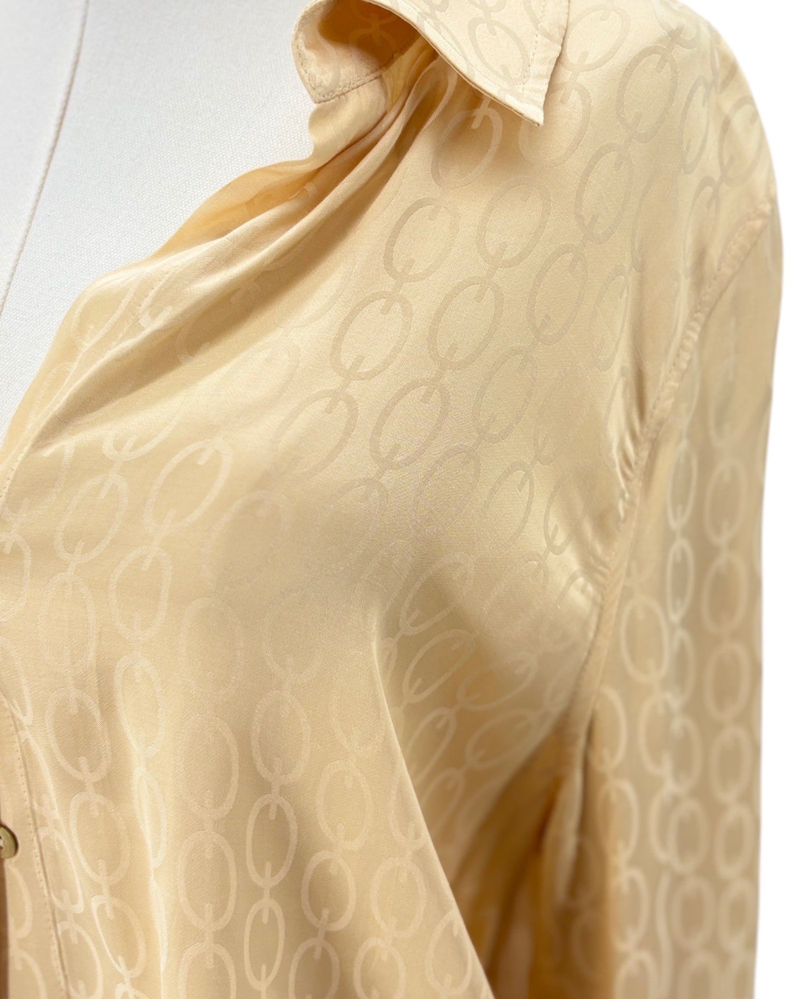 L'Agence shirt on a mannequin against a white background