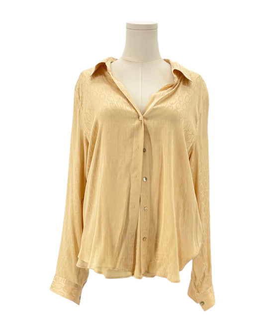 L'Agence shirt on a mannequin against a white background