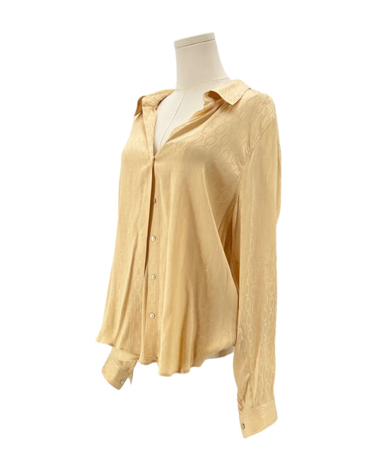 L'Agence shirt on a mannequin against a white background