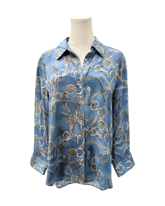 Blue patterned shirt on a mannequin against a white background