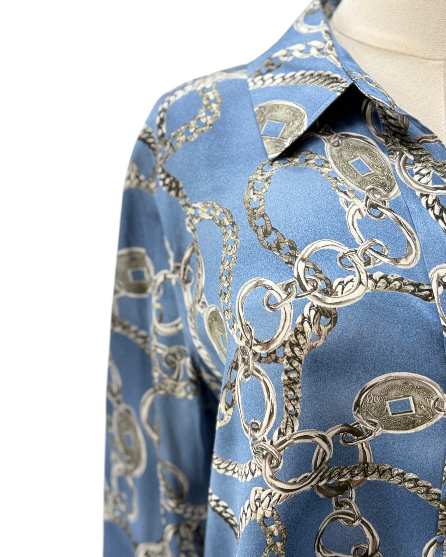 Blue shirt with chain and lock pattern on a white background